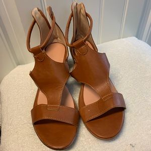 Sandals size 10. Heel zipper with small wedge style heel.